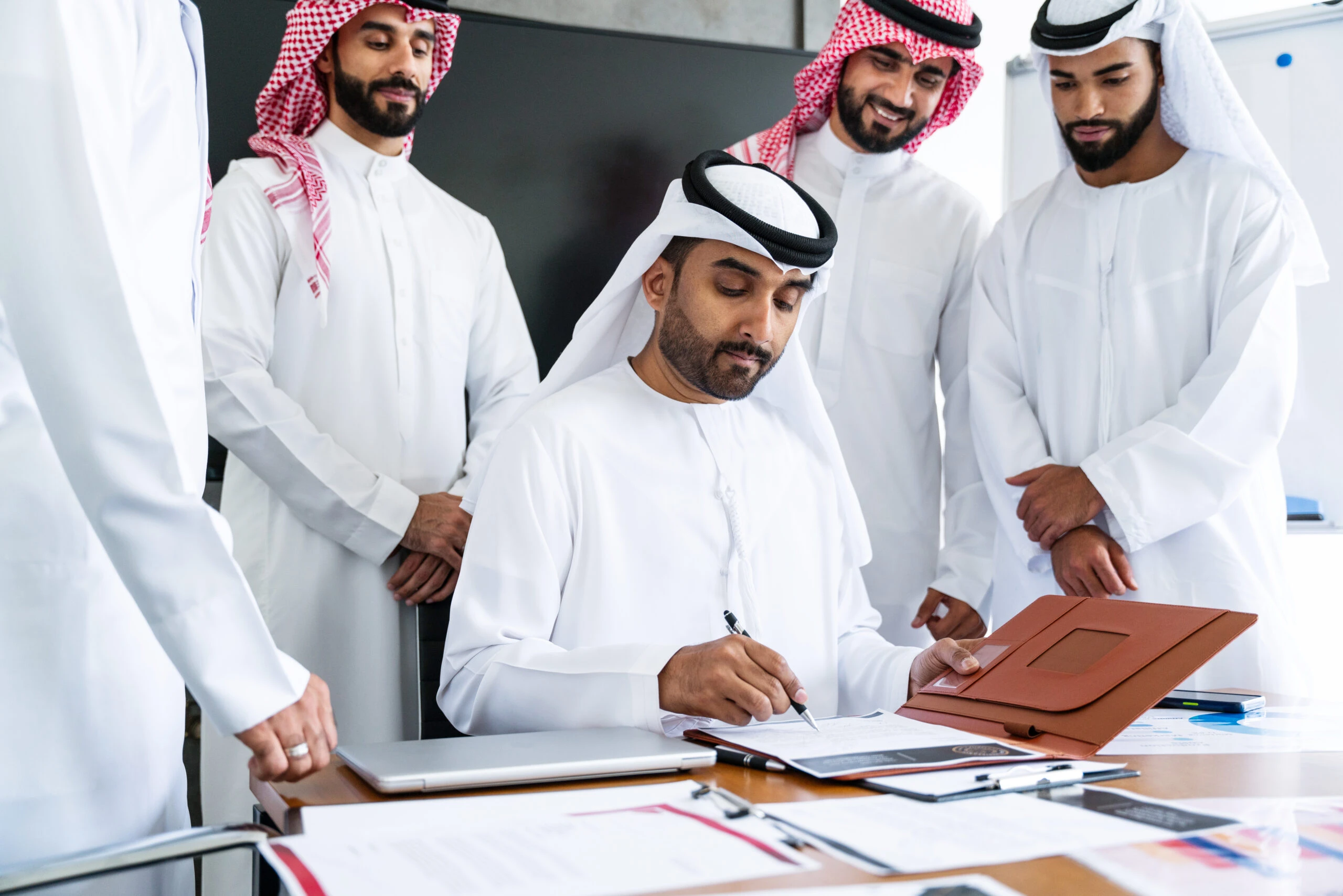 Reviewing and signing an account file, an institutional decision
