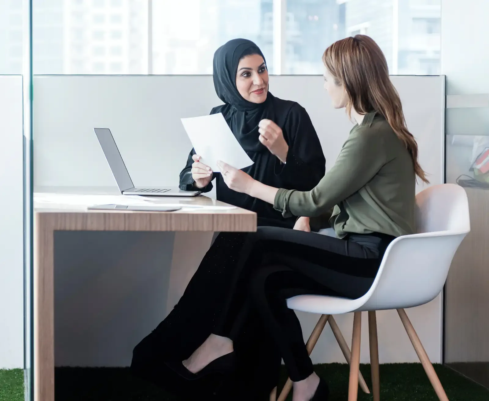 Advisor and client reviewing a UAE business setup plan